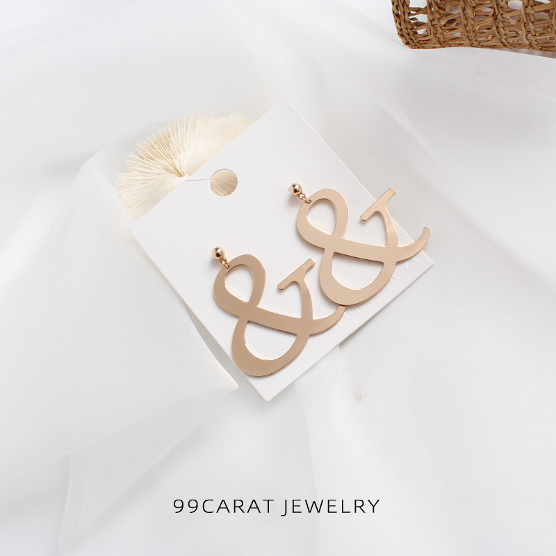 99克拉欧美夸张饰品and符号设计帅气个性金色金属亮片&女wy