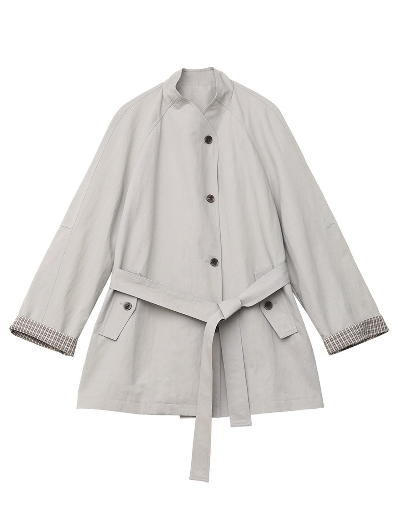 Light gray belted coat laid flat on a white background