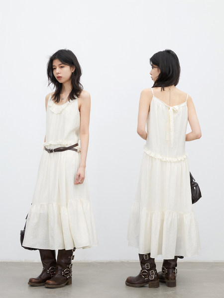 Cream sleeveless midi dress worn by a model, shown from front and back