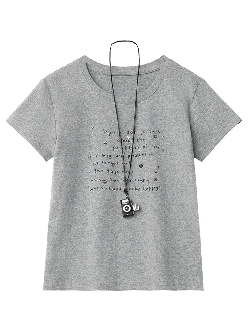 Gray short sleeve graphic t-shirt laid flat with a necklace accessory
