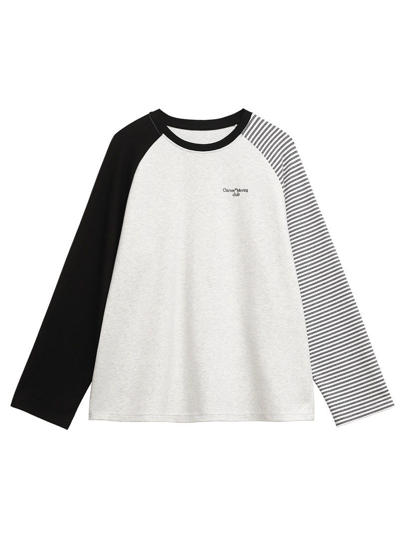 Black, white, and striped long-sleeve raglan shirt laid flat on a white background