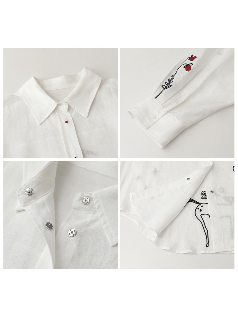 White long-sleeve collared shirt with embroidered floral details