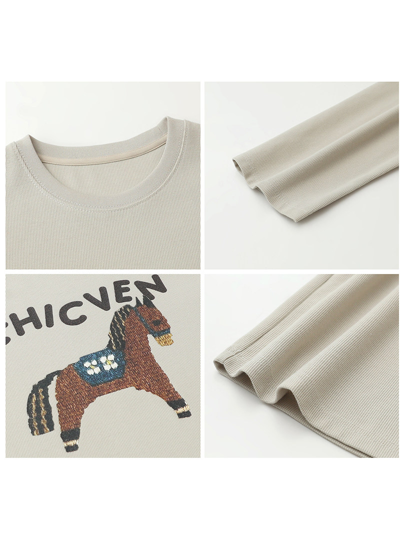 Beige ribbed long-sleeve top with a printed horse graphic and text detail