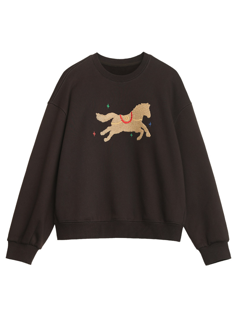 Black crewneck sweatshirt with a horse graphic laid flat on a white background