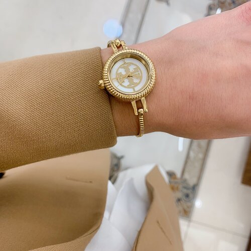 汤丽柏琦复古轻奢金色石英女表