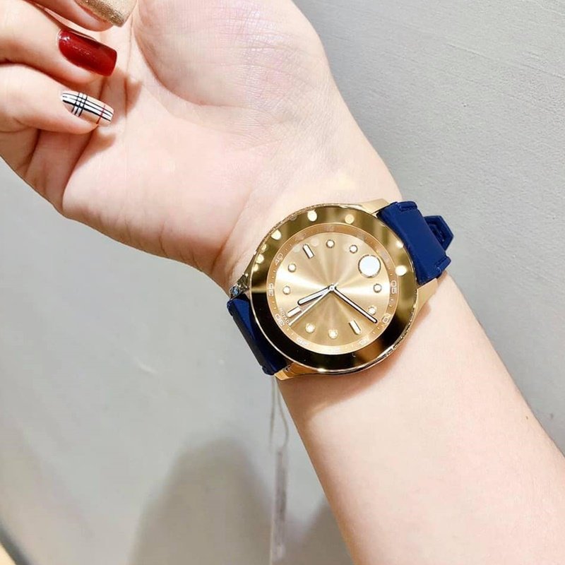 代购Movado 摩凡陀金色表盘蓝色硅胶表带石英手表女表时尚简约36