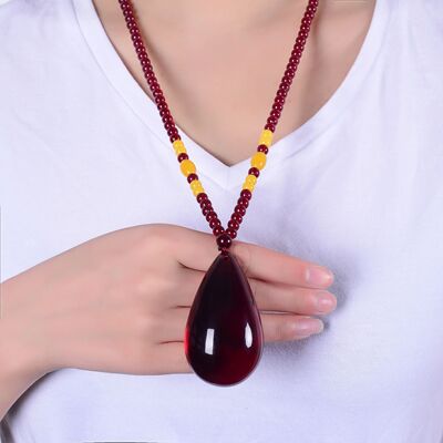新款珀血色毛衣链高档水滴吊坠长款百搭夏季仿蜡蜜项链女挂绳