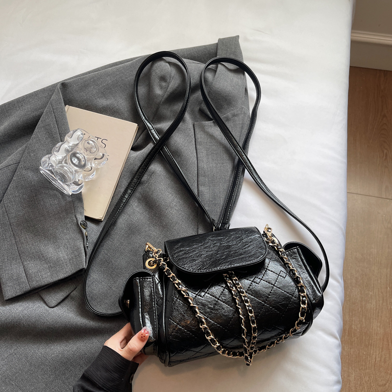 波卓尔女式复古双肩背包