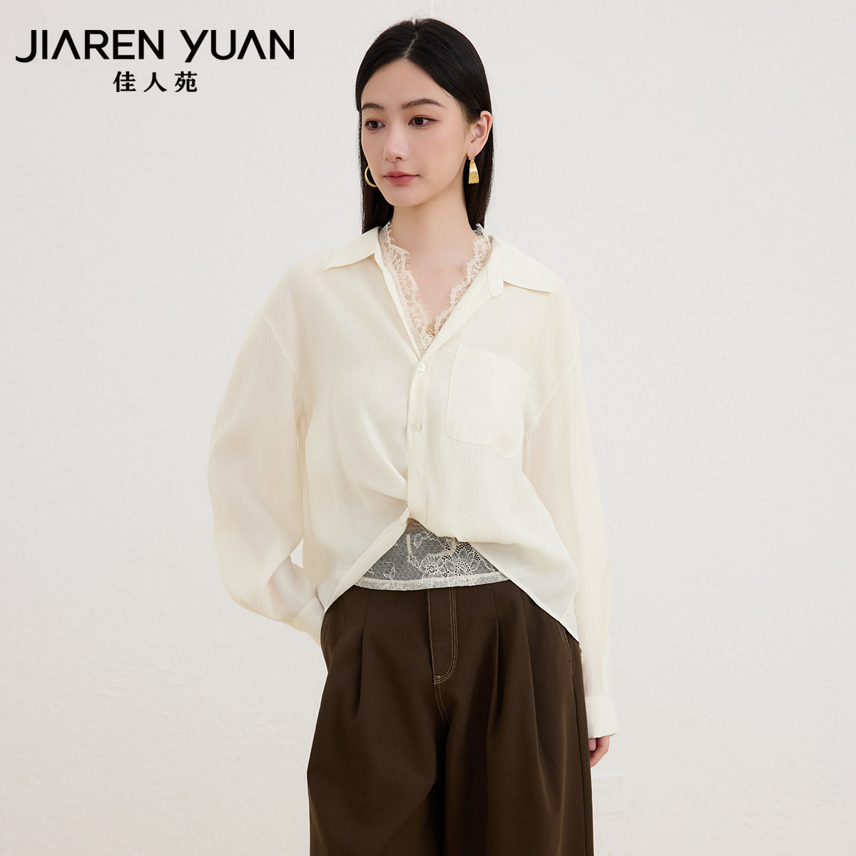佳人苑女装套装扭结设计