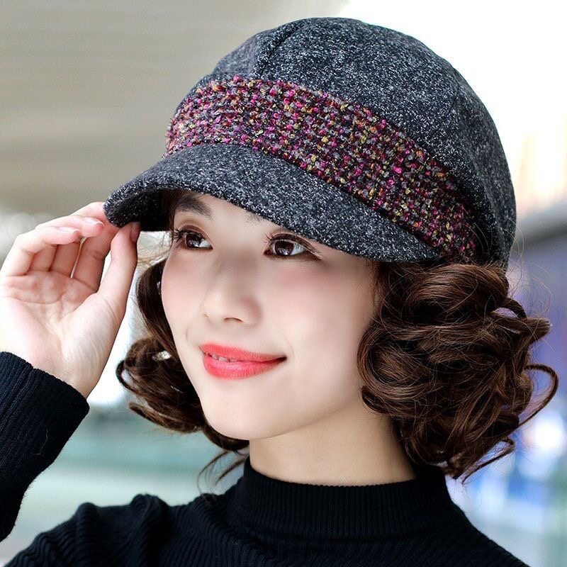 中老年帽子假发一体女短卷发假发逼真自然帽子带头发秋冬帽子发套属于什么档次？