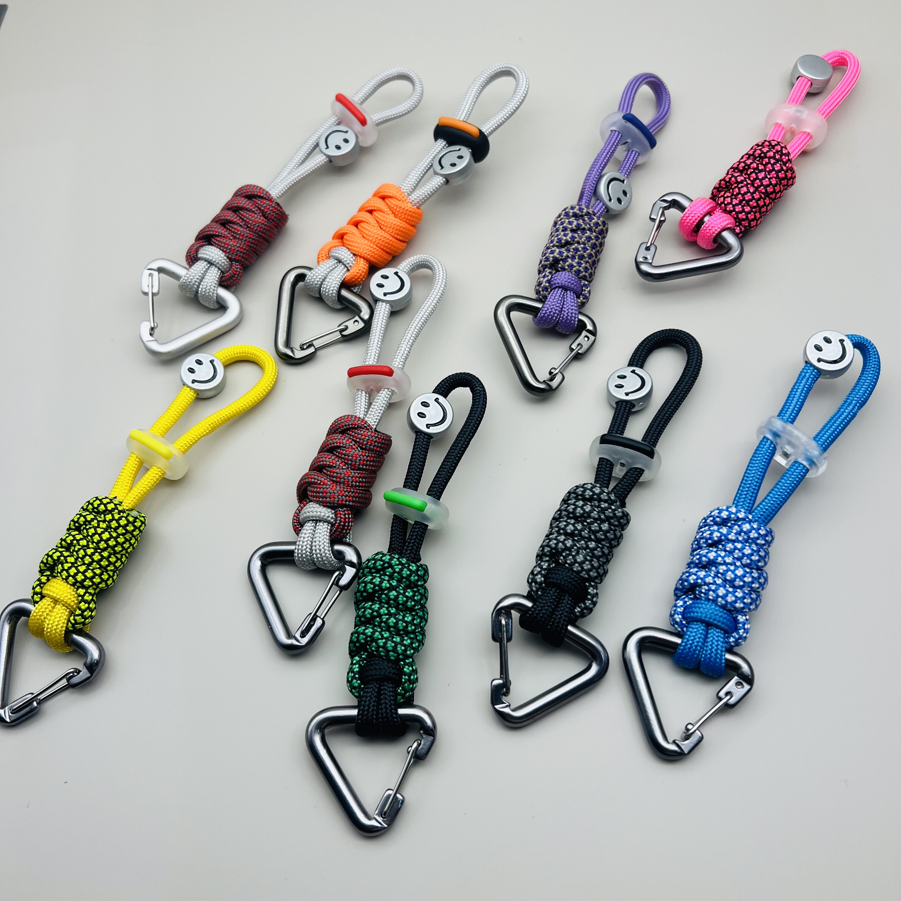 户外多用途耳机水瓶钥匙扣多色手工编织伞绳三角钥匙快挂扣挂文创