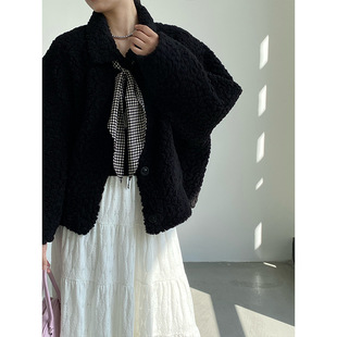 高级感黑色皮毛一体女25冬设计感小众短款宽松保暖上衣