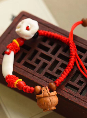 小孩桃核猪惊骨黑狗牙红绳手链