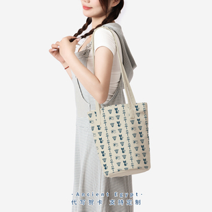 古埃及文创单肩包女2024新款百搭高级感布包荷鲁斯之眼猫咪水桶包