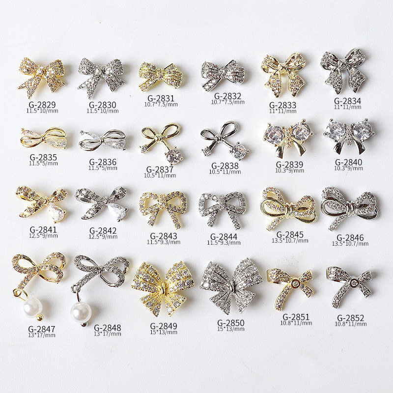 指甲装饰2022新款珍珠蝴蝶结吊坠金银色锆石日系上色奕嘉美甲饰品