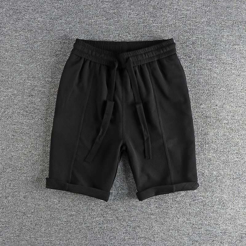 开衩设计纯色华夫格休闲男短裤