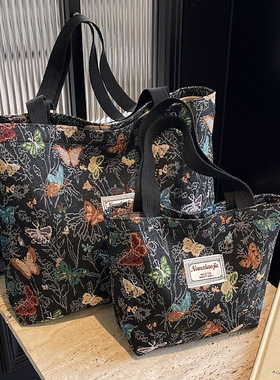 大容量蝴蝶帆布包包2026新款通勤托特包女ins时尚外出单肩妈咪包