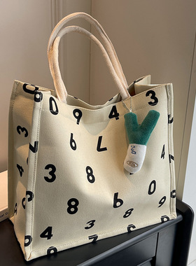 学生手提帆布通勤托特包2026时尚休闲妈咪包女ins百搭单肩上课包