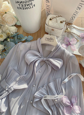 SUNDAY SEOUL「紫芋香氛」仙仙蝴蝶结系带珍珠扣喇叭袖珠光衬衫