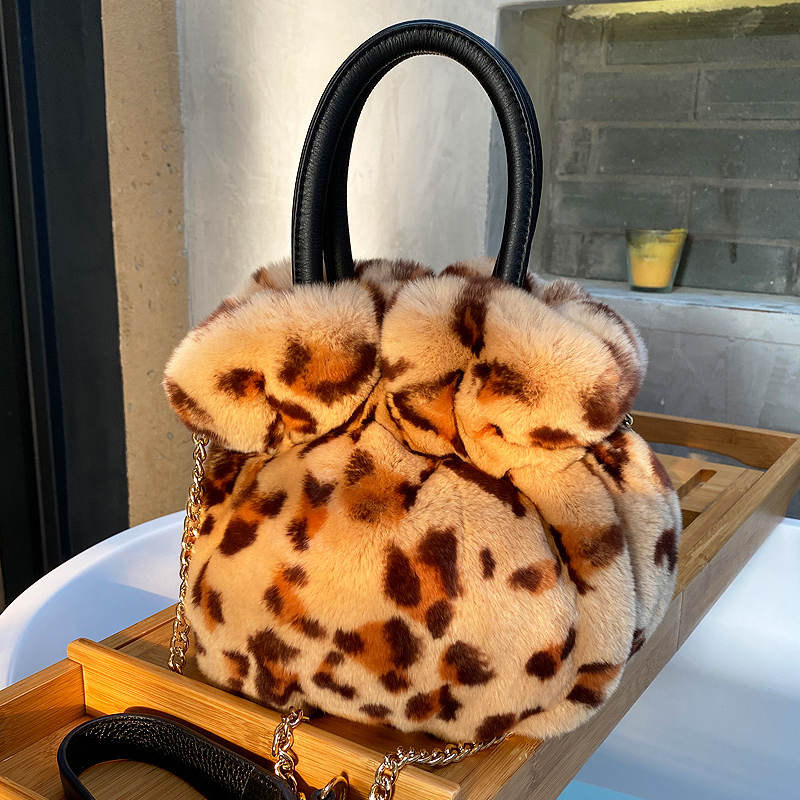 冬季獭兔毛包包女手提豹纹水桶包