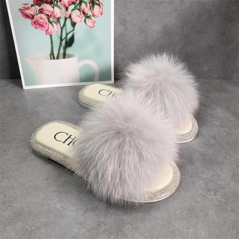 真毛狐狸毛水钻平底一字凉拖女