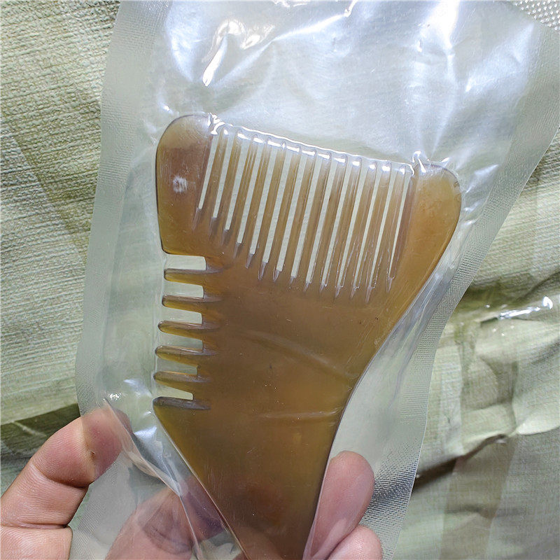 按摩梳黄牛角多功能小怪兽头部疗刮痧疏通经络脸部眼部按摩梳子