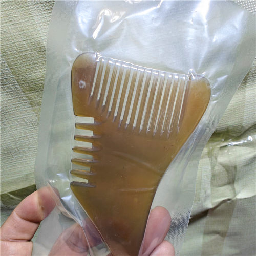 按摩梳黄牛角多功能小怪兽刮痧梳