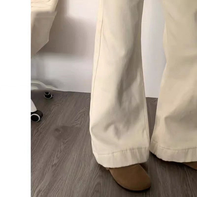 杏色加绒微喇牛仔裤女秋冬