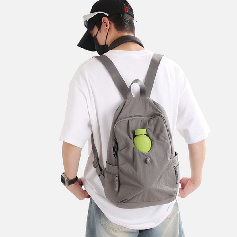 2025抽绳水杯前袋两侧可装伞游玩减负拉杆插带男女双肩大学生书包