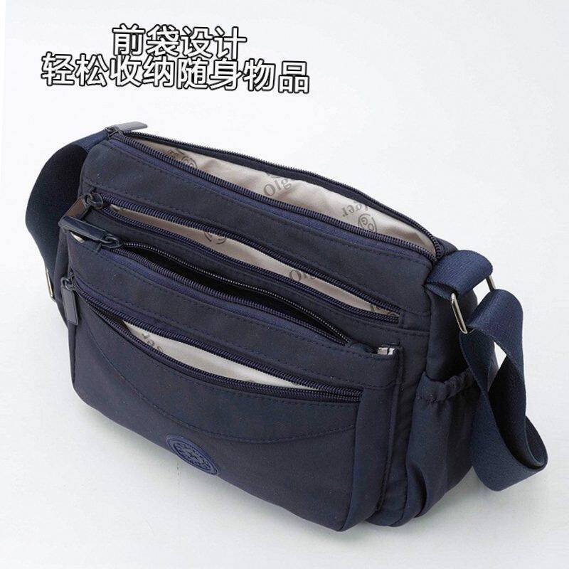 2026双侧袋多拉链男女纯色单肩斜挎手机证件伞逛街旅游妈妈背包潮