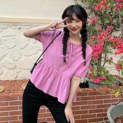 Two baby dresses with lace up design before and after age reduction