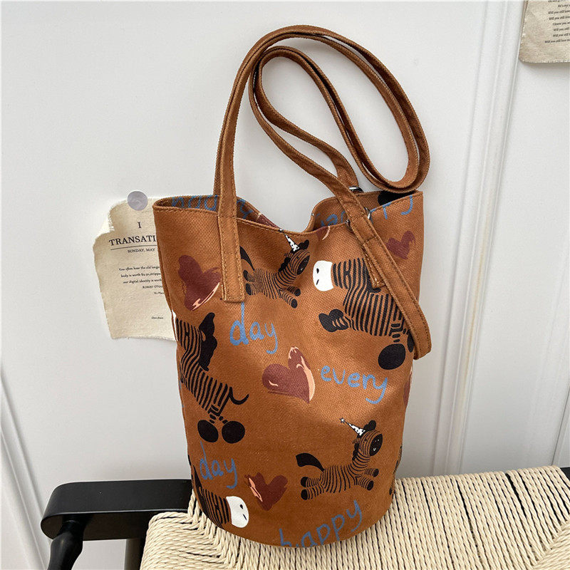 马年水桶包生肖斑马韩系帆布包小众高级感不撞款单肩包,箱包皮具/热销女包/男包,时尚帆布包,淘宝优惠券,粉丝福利购,淘宝优惠卷