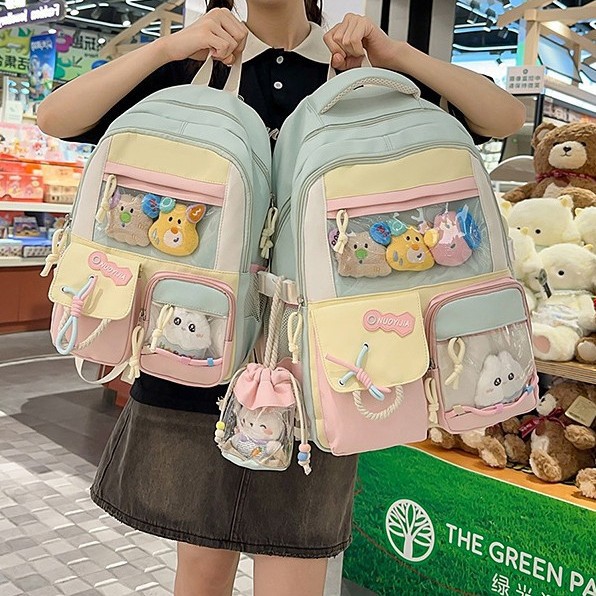 日系ins新款高颜值清新甜美少女吧唧痛包初高中生撞色拼接双肩包