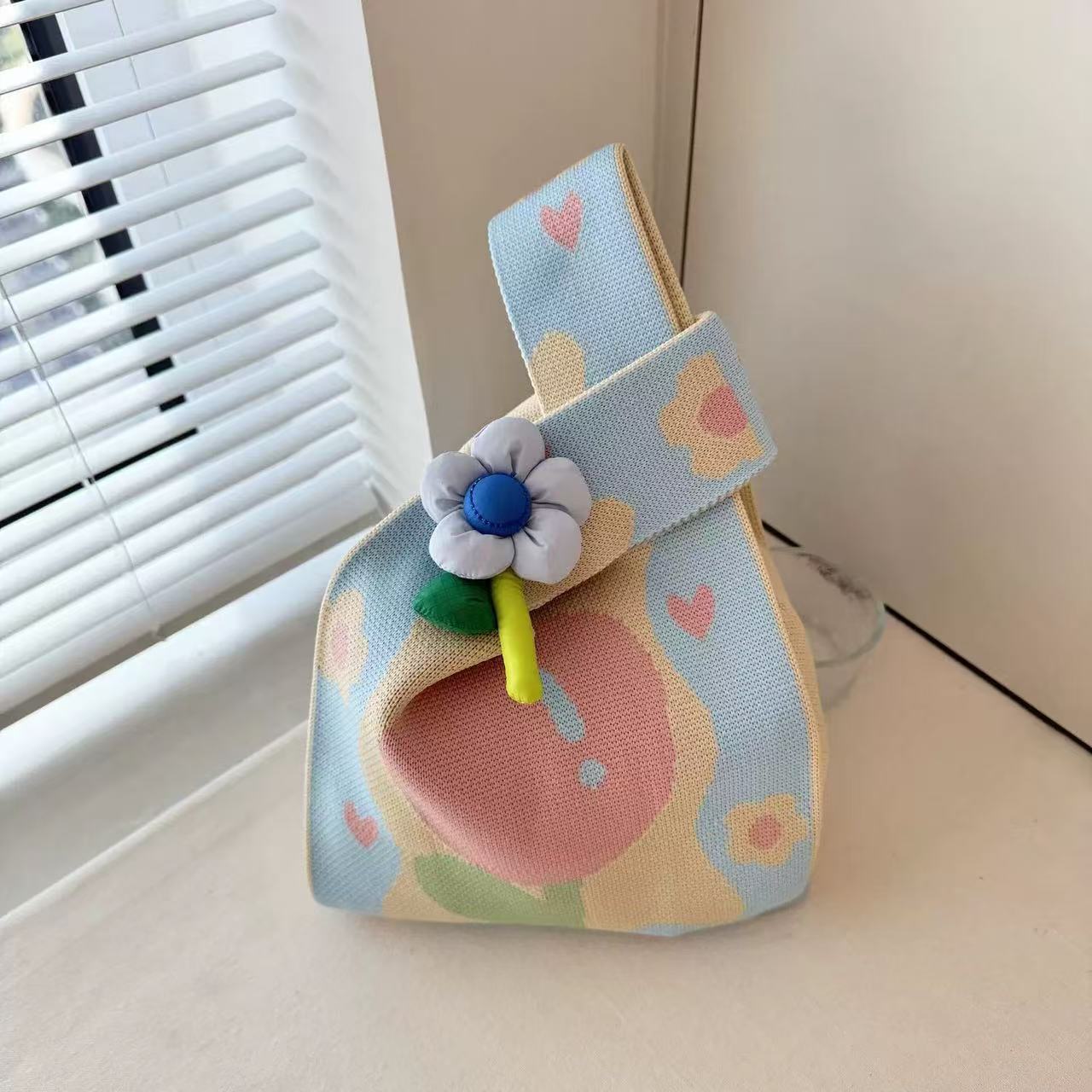 手提包2025新款优雅随行可爱花朵便携针织包韩版女精致手拎喜糖袋