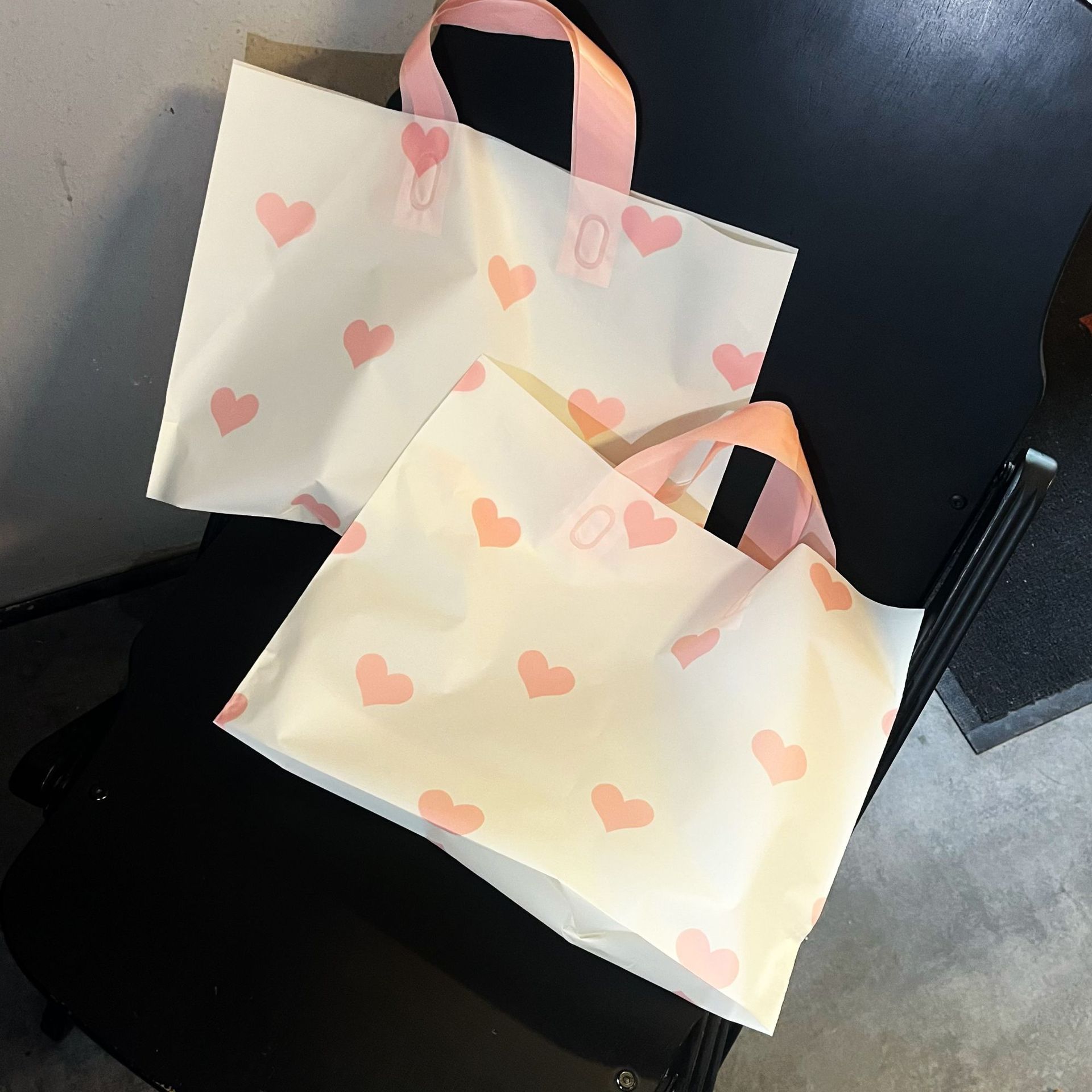 高档加厚磨砂笑脸手提袋子女童装店衣服塑料袋礼品服装店袋子定制