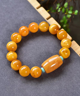 原矿天然欧洲回流鸡油黄蜜蜡手链设计蜜蜡路路通桶珠妖孽纹15.4mm