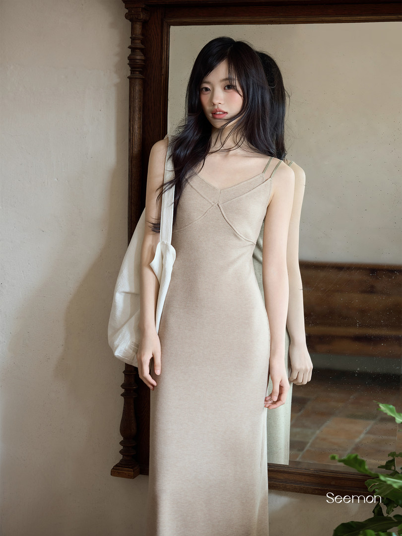Beige ribbed sleeveless fitted dress worn by a model