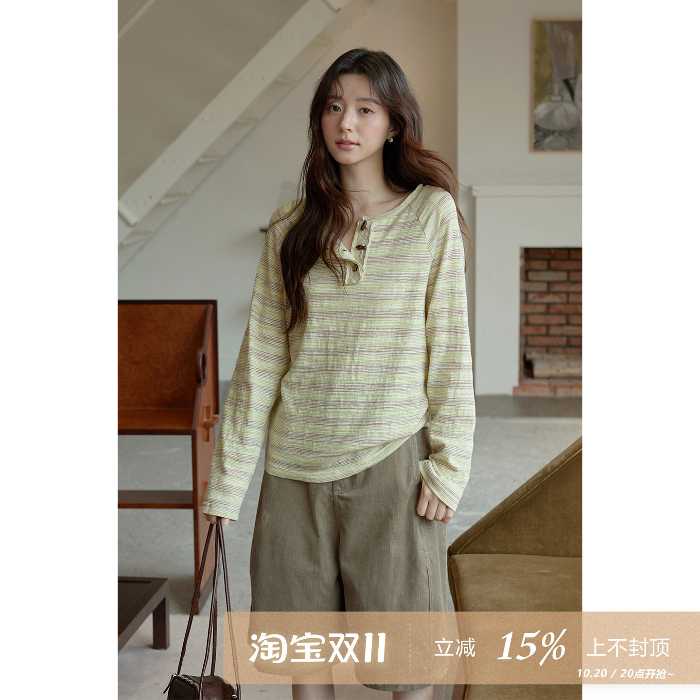 夕蒙2026新款秋季韩系漂亮好看上衣休闲宽松牛角扣条纹长袖t恤女