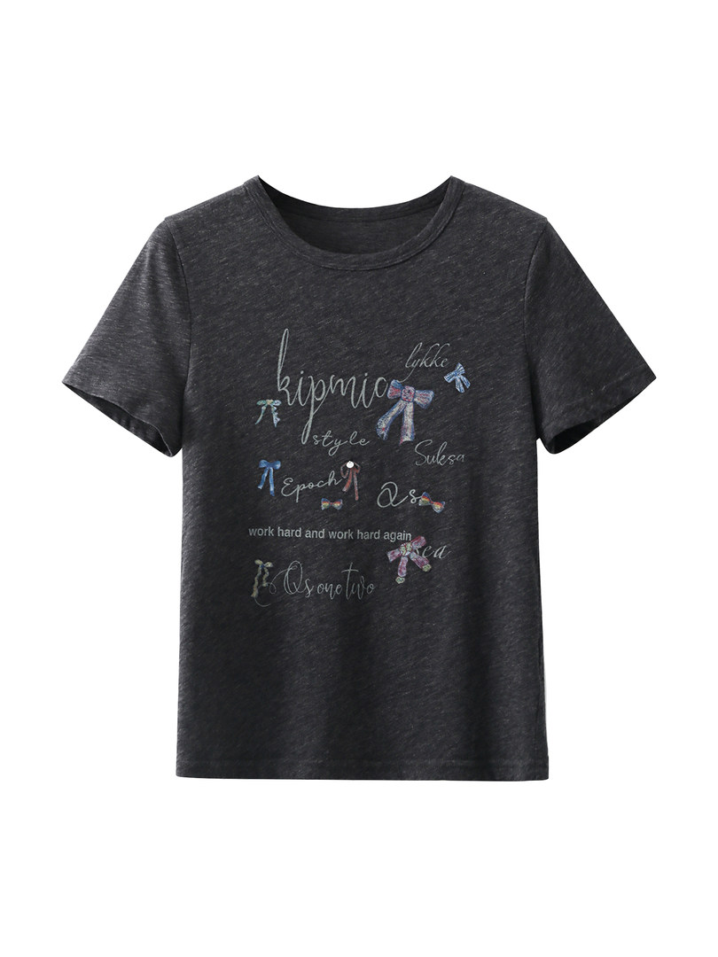 Black short-sleeve graphic T-shirt with printed decorative text and bows on a white background