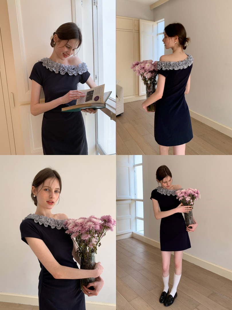 Black off-shoulder mini dress with a ruffled gray neckline worn by a model