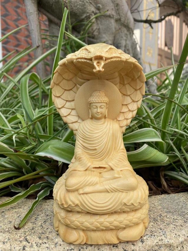 桧木释迦摩尼佛像摆件实木质家居供奉如来佛祖工艺品蛇佛装饰