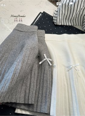 蝴蝶结高腰针织大裙摆格半身短裙