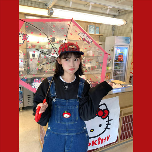 可爱苹果KT做旧背带裤卷边牛仔裤