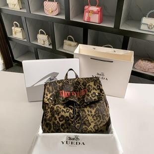 豹纹牛仔布双肩包包2024新款潮流时尚翻盖大容量书包帆布背包男女