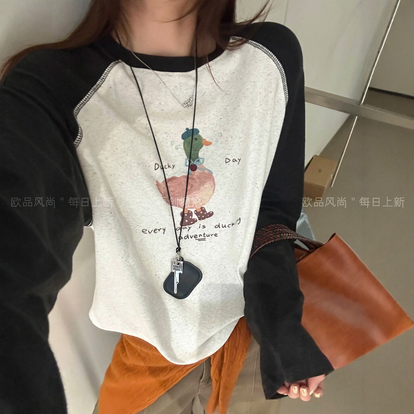 卡通鸭子印花插肩袖T恤女欧洲站