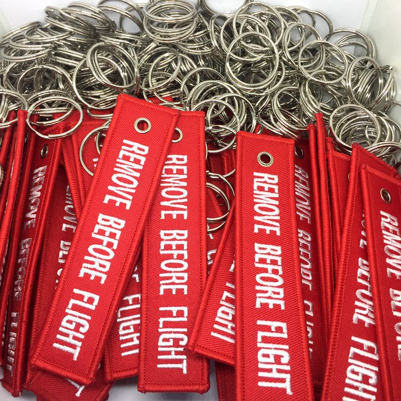REMOVE BEFORE FLIGHT绣花织唛纺织加工.  金属铸造材料加工装配