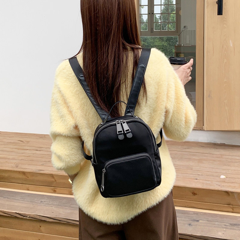 时尚小背包新款防水旅游双肩包女休闲百搭牛津纺配牛皮街头潮爆款