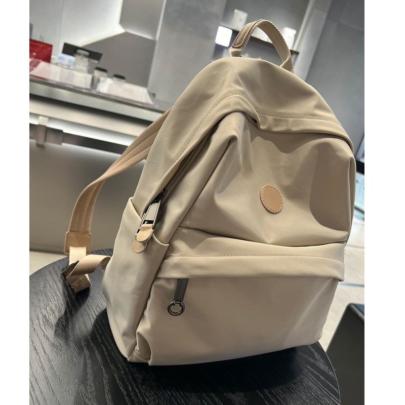 新款双肩包轻便防水背包旅游旅行双肩背包电脑包学生书包牛津纺潮