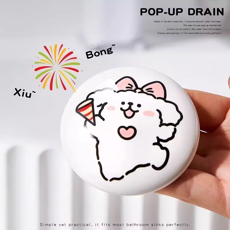 可爱线条小狗陶瓷洗脸盆卫生间下水器洗手池漏水塞面盆创意弹跳芯