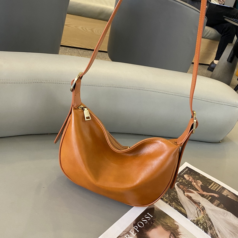 贝尔高档头层牛皮饺子包大号